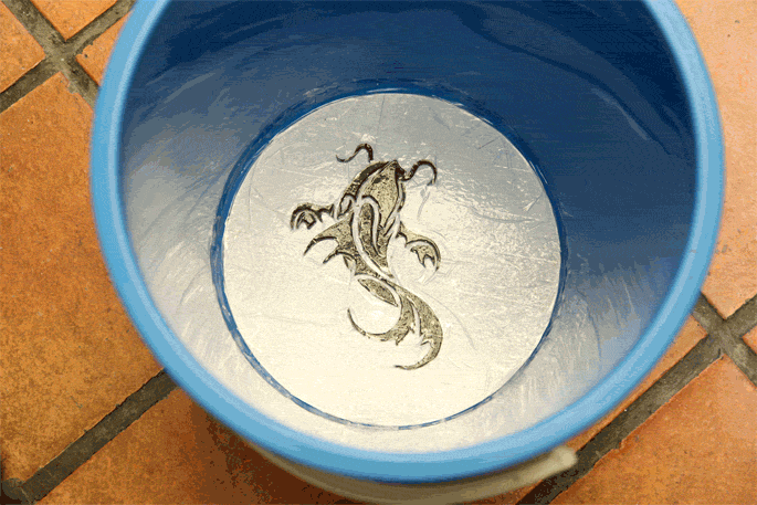DIY Remix: Koi Fish $5 Bucket Stool DIY - Step 5 Pouring the cement