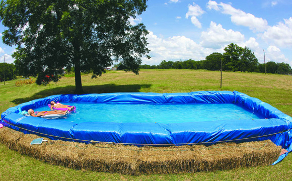 7 DIY Swimming Pool Ideas and Designs: From Big Builds to Weekend Projects - #7 Hay bale swimming pool